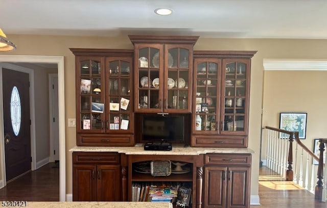 bar with dark wood-style floors, baseboards, and recessed lighting