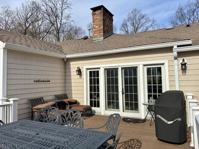 wooden terrace featuring french doors