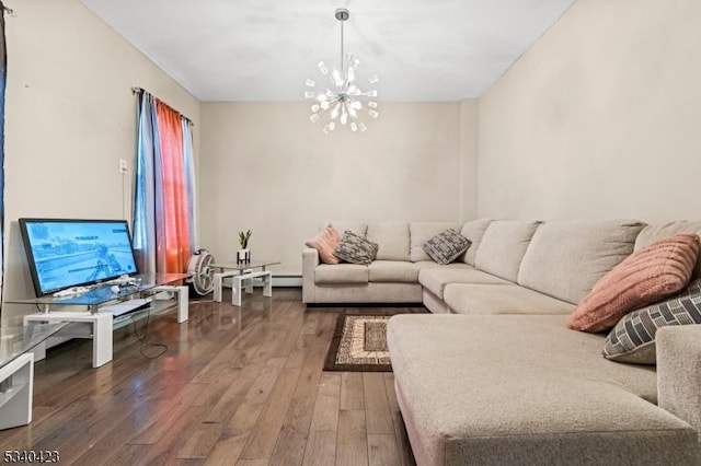 living area featuring wood-type flooring and a notable chandelier