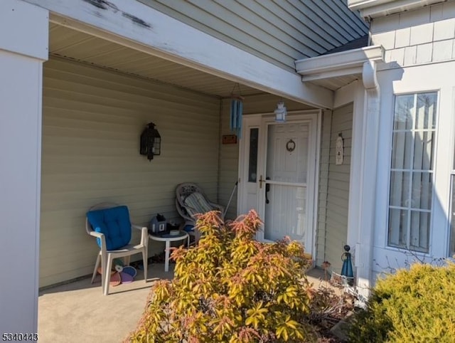 property entrance with a patio