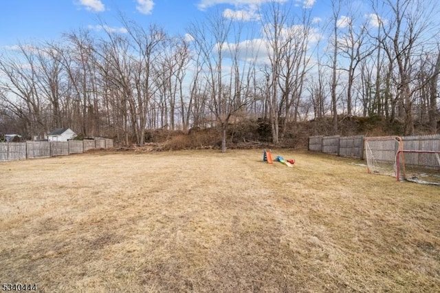 view of yard with fence