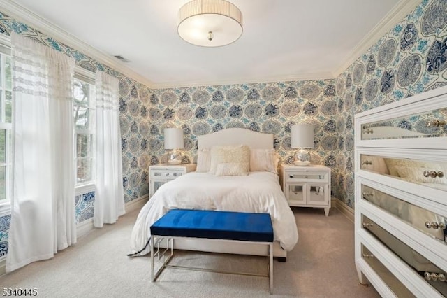 bedroom featuring visible vents, ornamental molding, carpet floors, wallpapered walls, and baseboards