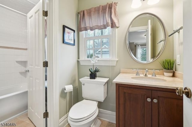 full bath featuring vanity, baseboards, shower / bathing tub combination, tile patterned floors, and toilet