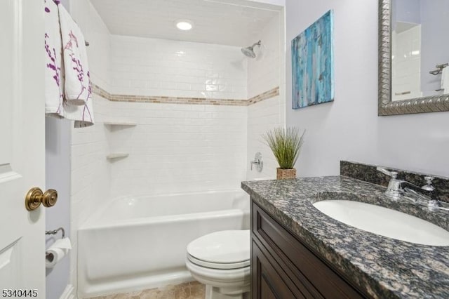 full bathroom featuring shower / bathing tub combination, toilet, and vanity