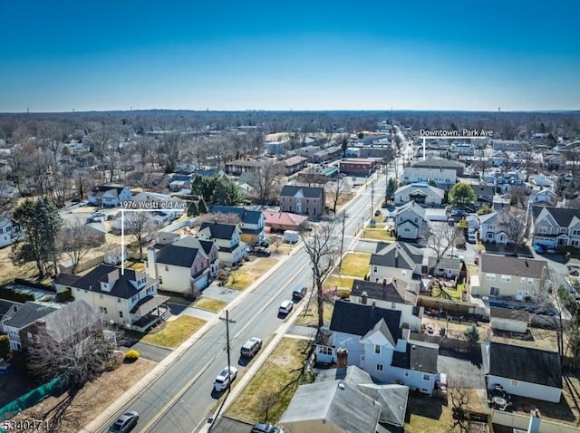 birds eye view of property with a residential view