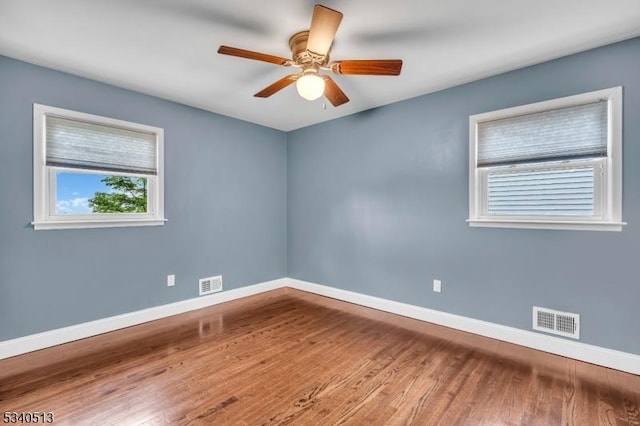 637 Bensel Dr, Mount Arlington Boro, NJ 07850 - spare room with baseboards, a ceiling fan, and wood finished floors