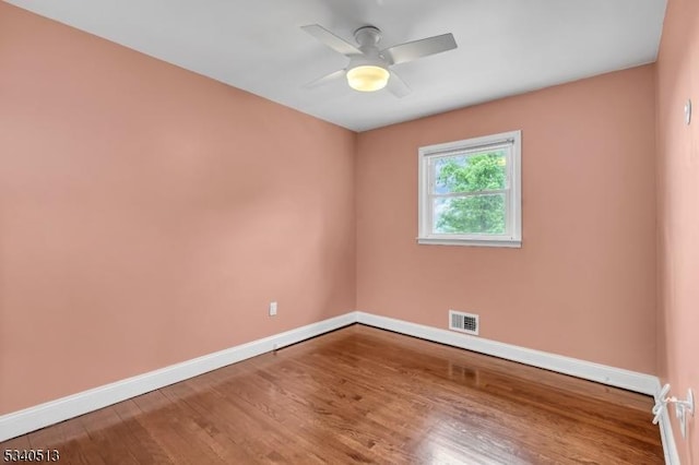 637 Bensel Dr, Mount Arlington Boro, NJ 07850 - unfurnished room with baseboards, wood finished floors, and a ceiling fan