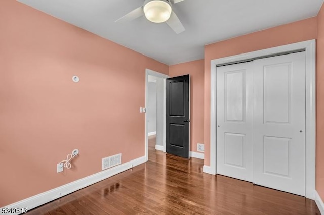 637 Bensel Dr, Mount Arlington Boro, NJ 07850 - unfurnished bedroom with baseboards, a closet, wood finished floors, and a ceiling fan