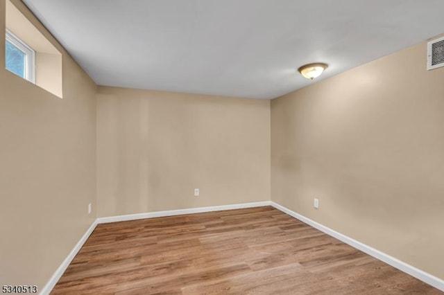 637 Bensel Dr, Mount Arlington Boro, NJ 07850 - unfurnished room with baseboards and wood finished floors