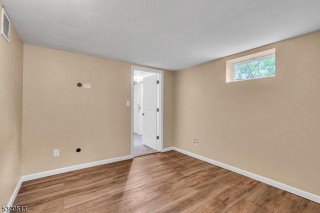 637 Bensel Dr, Mount Arlington Boro, NJ 07850 - empty room featuring wood finished floors and baseboards