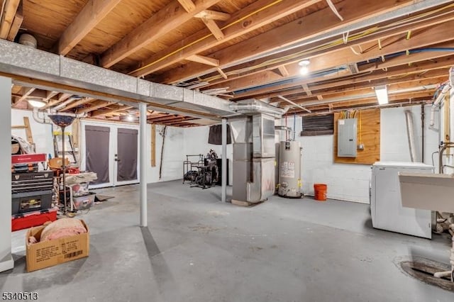 637 Bensel Dr, Mount Arlington Boro, NJ 07850 - unfinished below grade area with water heater, washer / clothes dryer, electric panel, heating unit, and a sink