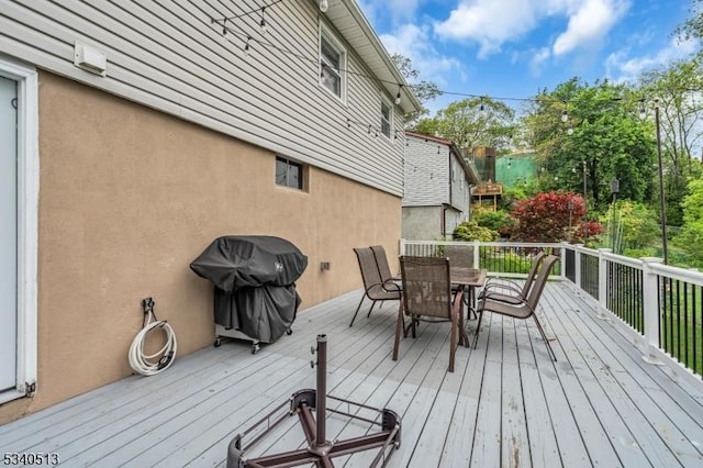 637 Bensel Dr, Mount Arlington Boro, NJ 07850 - wooden deck with outdoor dining space and area for grilling