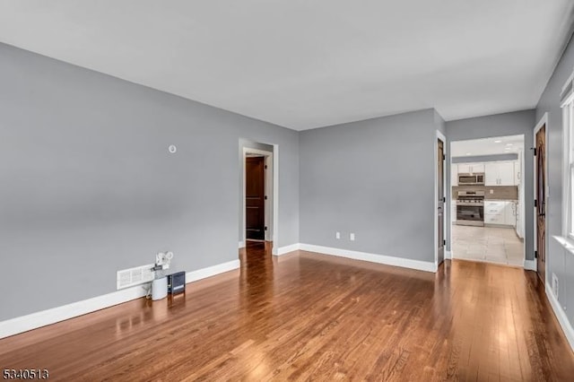 637 Bensel Dr, Mount Arlington Boro, NJ 07850 - unfurnished room with wood finished floors and baseboards