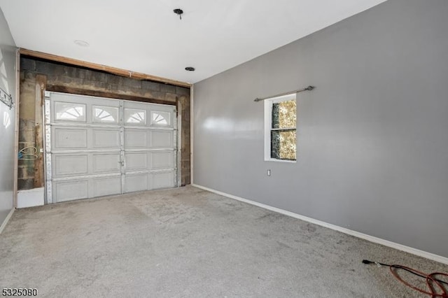 garage with baseboards