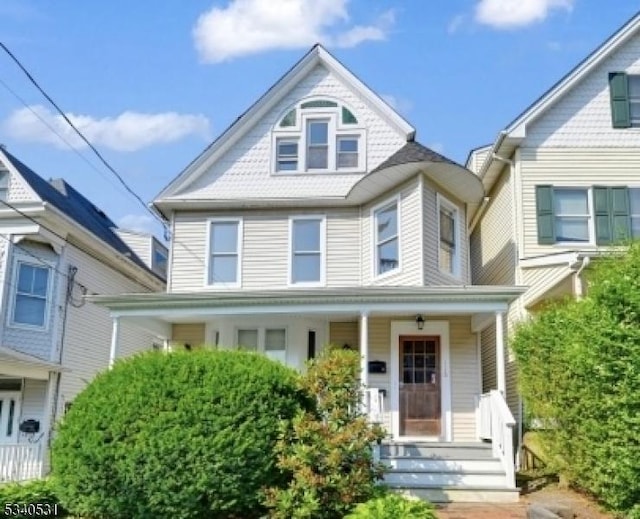 victorian home featuring a porch