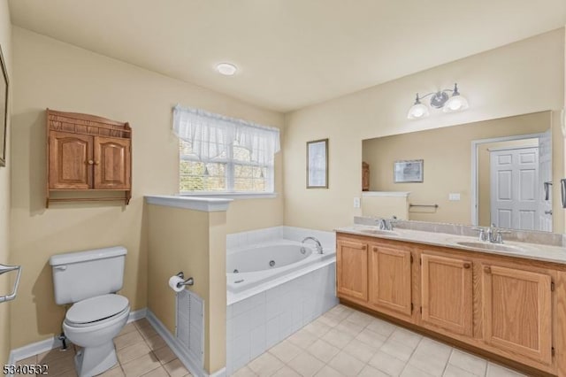 bathroom with visible vents, a jetted tub, a sink, and toilet