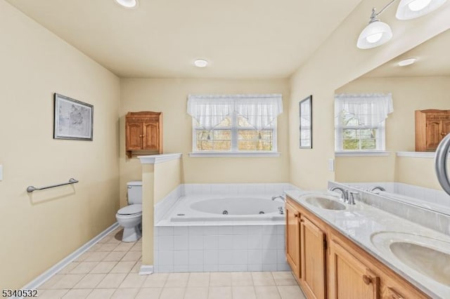 full bathroom with a whirlpool tub, tile patterned flooring, and a sink