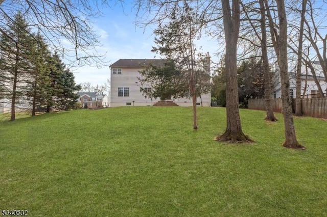 view of yard featuring fence