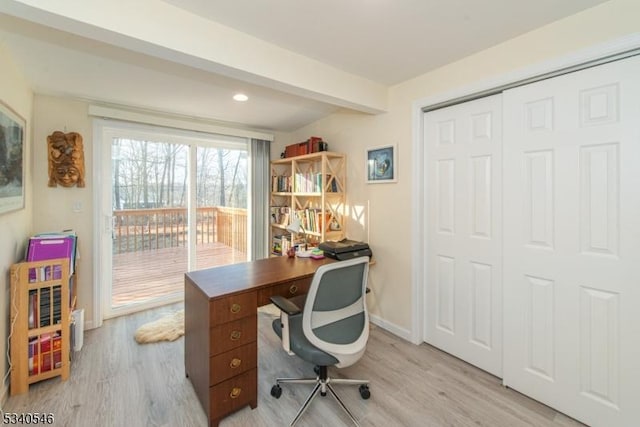 office area with light wood-style flooring, baseboards, beam ceiling, and recessed lighting