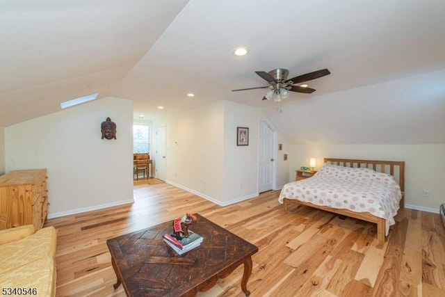 bedroom with recessed lighting, a ceiling fan, vaulted ceiling, light wood-type flooring, and baseboards