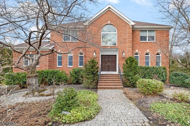 view of front facade featuring brick siding