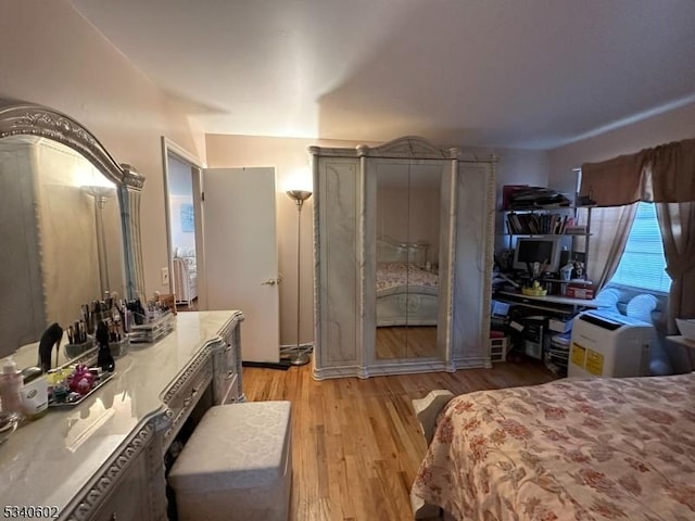 bedroom with light wood-type flooring