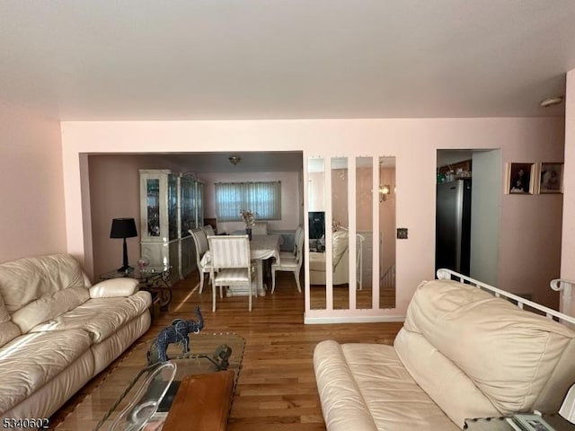 living room with wood finished floors