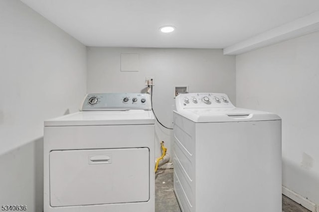 laundry room with washing machine and dryer and laundry area