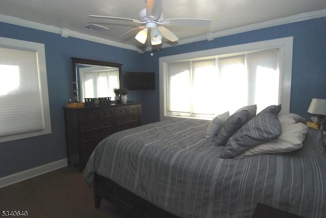 bedroom with ornamental molding, visible vents, ceiling fan, and baseboards