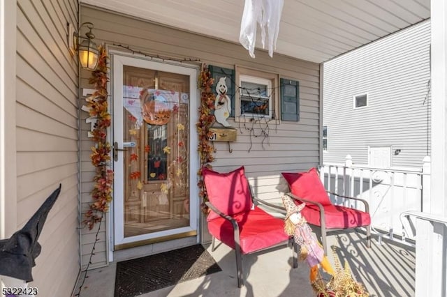 entrance to property with a porch