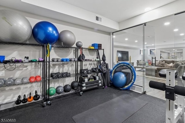 workout room featuring visible vents