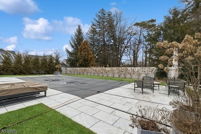 view of patio with fence