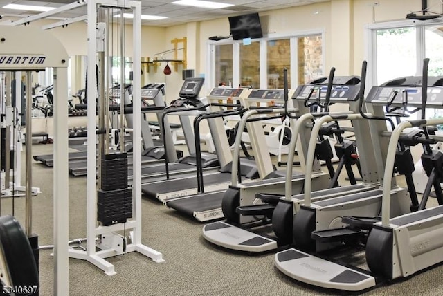 gym with a drop ceiling