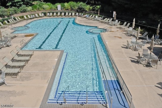 pool with a patio area