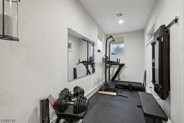 workout room featuring visible vents