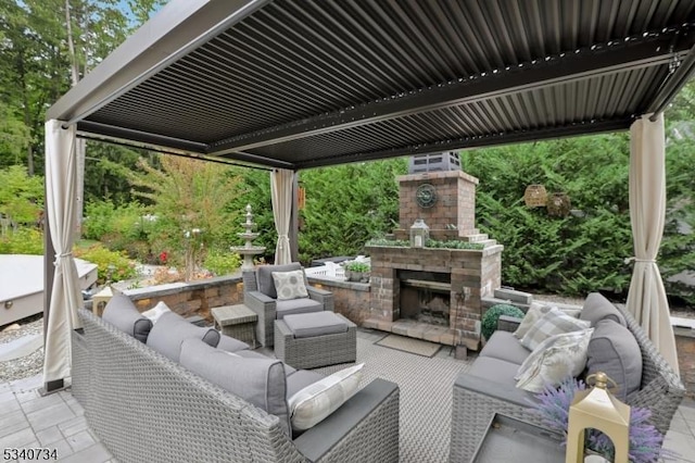 view of patio / terrace with an outdoor living space with a fireplace