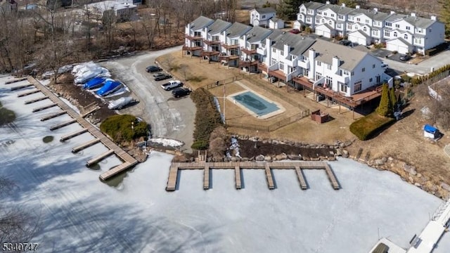 birds eye view of property with a residential view