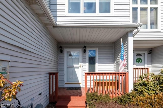 doorway to property featuring a porch