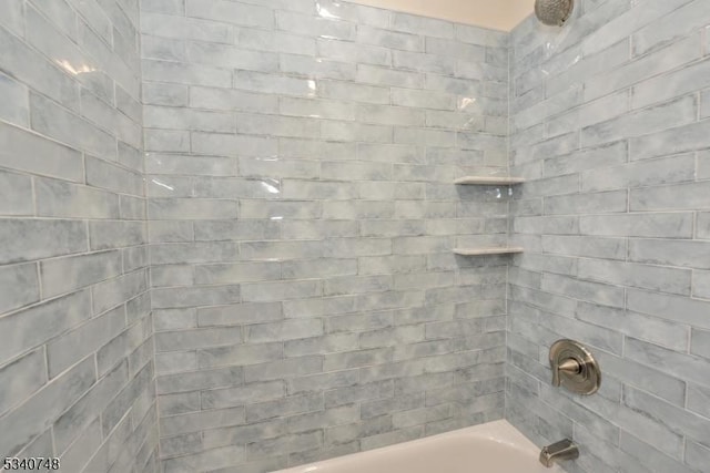 bathroom featuring shower / tub combination