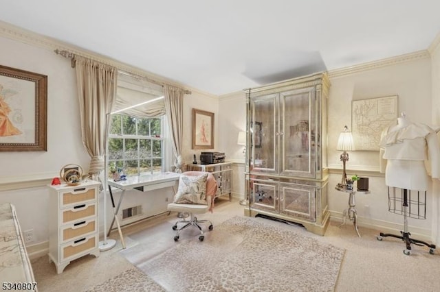 sitting room with light carpet, baseboards, visible vents, and crown molding