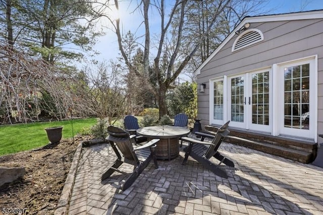 view of patio featuring entry steps and french doors