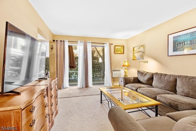 living area with carpet floors and a wall unit AC