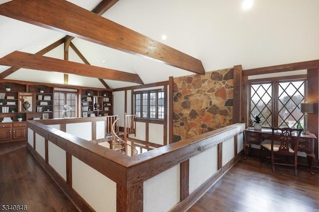 corridor with vaulted ceiling with beams and dark wood-style floors