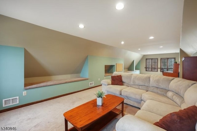 living room featuring baseboards, visible vents, and carpet flooring