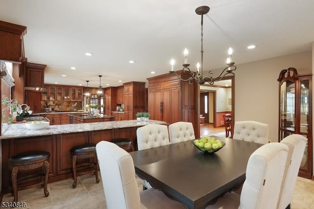 dining space with recessed lighting