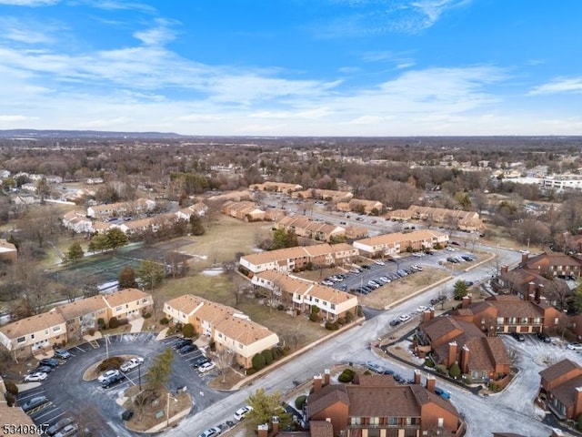 birds eye view of property with a residential view