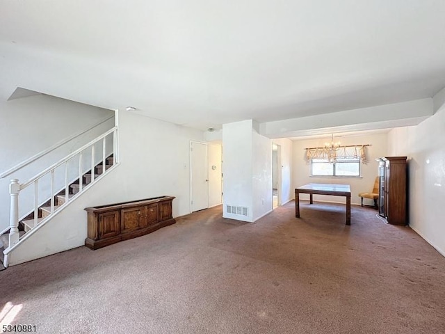 recreation room featuring a chandelier, carpet flooring, and visible vents