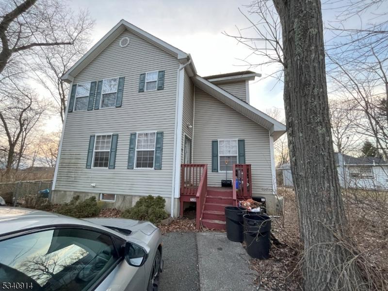 view of front of home with fence