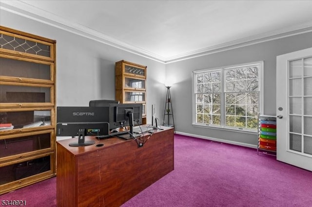 office area featuring dark carpet, crown molding, and baseboards