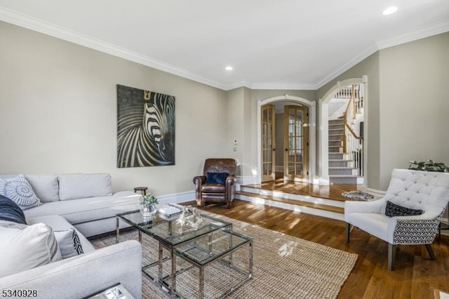 35 Geiger Ln, Warren Twp, NJ 07059 - living area with arched walkways, wood finished floors, ornamental molding, stairs, and recessed lighting